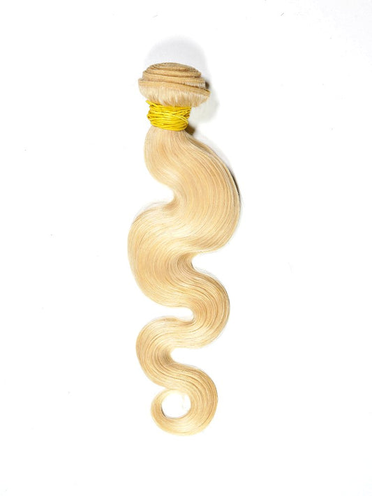 Russian Blonde Body Wave Hair Extensions are soft, wavy and absolutely beautiful. Our super premium blonde hair extensions can be colored and styled to perfection.  Lengths:  12" - 26" Hair Grade: VIRGIN HAIR Wefts:  Machine Double Stitch Style:  Body Wave Weight:  100 grams / 3.5 oz